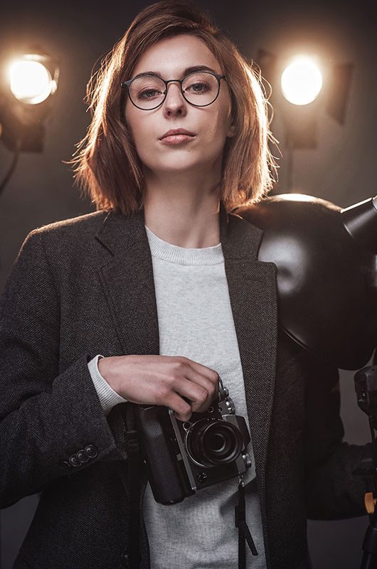 beautiful-redhead-female-photographer-holds-a-digi-resize.jpg beautiful-redhead-female-photographer-holds-a-digi-resize.jpg