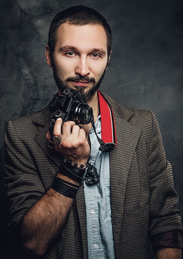 man-is-posing-for-photographer-with-photo-camera-resize.jpg man-is-posing-for-photographer-with-photo-camera-resize.jpg